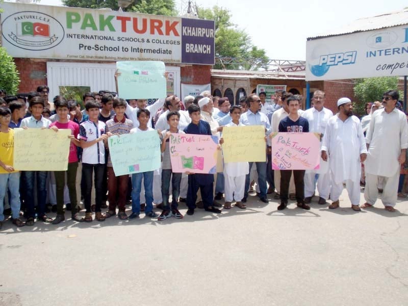 the students and their parents carried placards with slogans in favour of pak turk school and expressed solidarity with the school management photo express