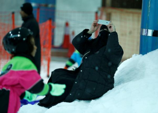 a saudi woman takes a selfie in the new snow city at al othaim mall in riyadh saudi arabia photo reuters a saudi woman takes a selfie in the new snow city at al othaim mall in riyadh saudi arabia photo reuters