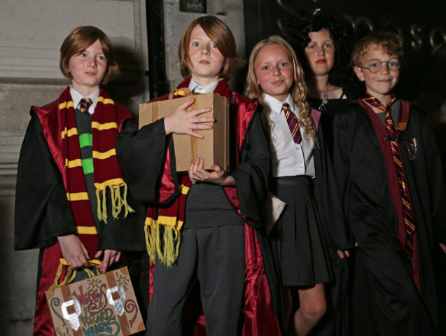 children dressed as characters from the harry potter books pose for a photograph as they wait in the queue outside waterstones bookshop on piccadilly in central london on july 30 2016 ahead of the midnight party to celebrate the publication of the quot harry potter and the cursed child parts one amp two quot script book photo afp children dressed as characters from the harry potter books pose for a photograph as they wait in the queue outside waterstones bookshop on piccadilly in central london on july 30 2016 ahead of the midnight party to celebrate the publication of the quot harry potter and the cursed child parts one amp two quot script book photo afp