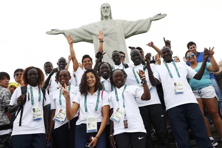 members of the olympic refugee team including yusra mardini from syria c pose in front of christ the redeemer on july 30 2016 photo reuters members of the olympic refugee team including yusra mardini from syria c pose in front of christ the redeemer on july 30 2016 photo reuters