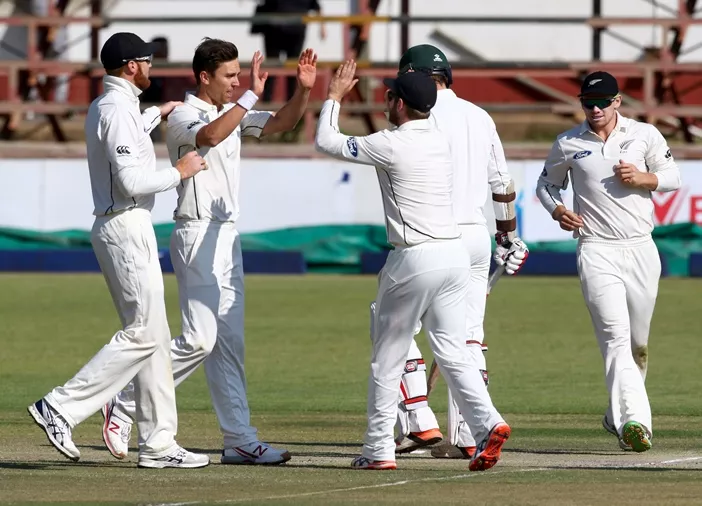 new zealand bowler trent boult c celebrates a wicket with his teammates during the fourth day of the first test match in a series of two tests between new zealand and hosts zimbabwe at queens sports club in bulawayo july 31 2016 photo afp new zealand bowler trent boult c celebrates a wicket with his teammates during the fourth day of the first test match in a series of two tests between new zealand and hosts zimbabwe at queens sports club in bulawayo july 31 2016 photo afp