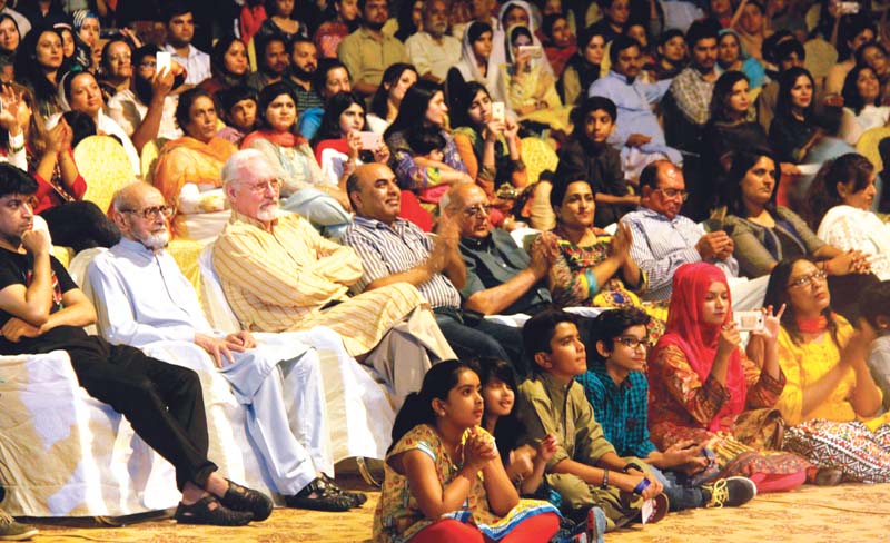 the crowd enjoys a performance by the sketches band in a concert at lok virsa held on saturday photos express