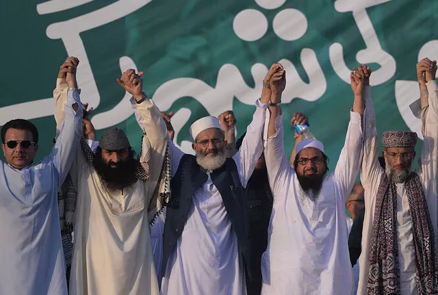 hizbul mujahideen and religious parties leaders joined hands at a rally to show solidarity with indian kashmiri muslims as they observed a 039 black day 039 to denounce the actions of indian security forces in indian administered kashmir in islamabad on july 20 2016 photo afp hizbul mujahideen and religious parties leaders joined hands at a rally to show solidarity with indian kashmiri muslims as they observed a 039 black day 039 to denounce the actions of indian security forces in indian administered kashmir in islamabad on july 20 2016 photo afp