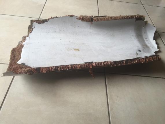 a piece of debris found by a south african family off the mozambique coast in december 2015 which authorities will examine to see if it is from missing malaysia airlines flight mh370 is pictured in this handout photo photo reuters