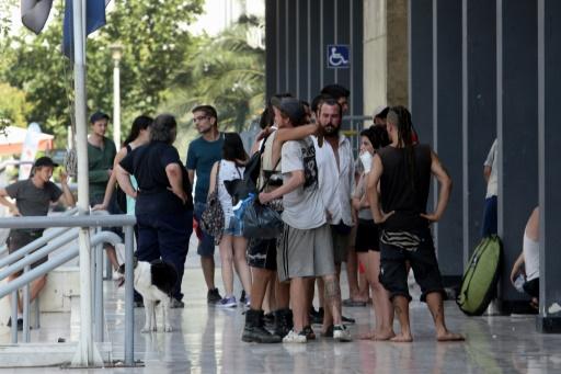 pro refugee activists cleared of disrupting greek mass photo afp