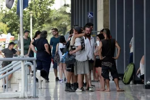pro refugee activists cleared of disrupting greek mass photo afp pro refugee activists cleared of disrupting greek mass photo afp