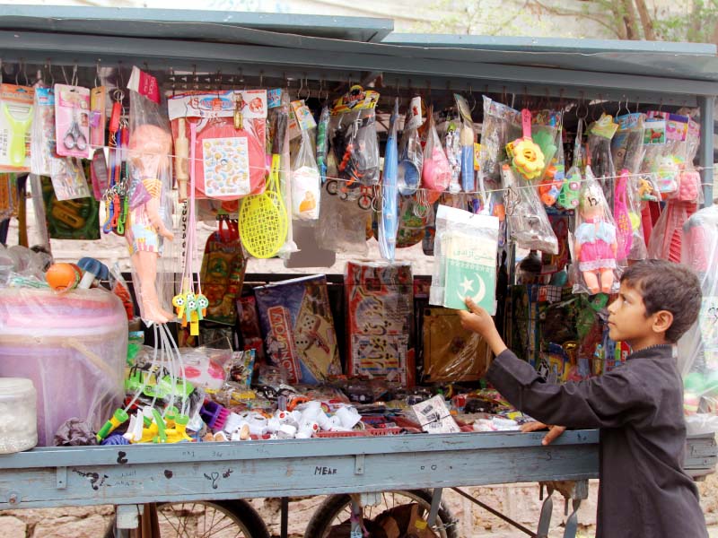 the toy seller who is younger than his customers