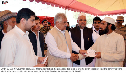 flood victims governor distributes cheques flood victims governor distributes cheques