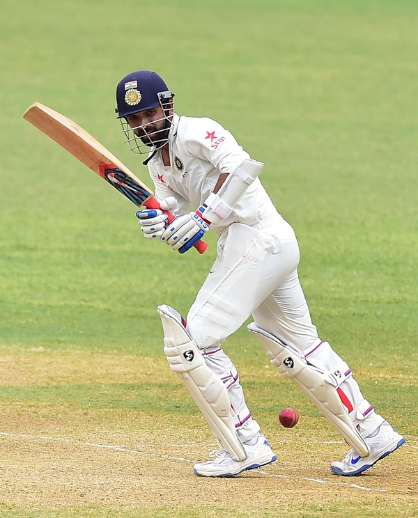 ajinkya rahane connects for a hit off bowler miguel cummins at sabina park in kingston jamaica photo afp