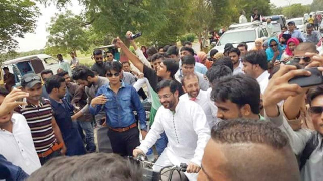 the two mqm leaders hitched a ride into ku after being denied entrance in their own vehicles photo express the two mqm leaders hitched a ride into ku after being denied entrance in their own vehicles photo express
