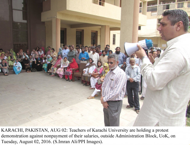 teachers at karachi university hold a protest over non payment of their salaries outside administration block ku on tuesday photo ppi teachers at karachi university hold a protest over non payment of their salaries outside administration block ku on tuesday photo ppi