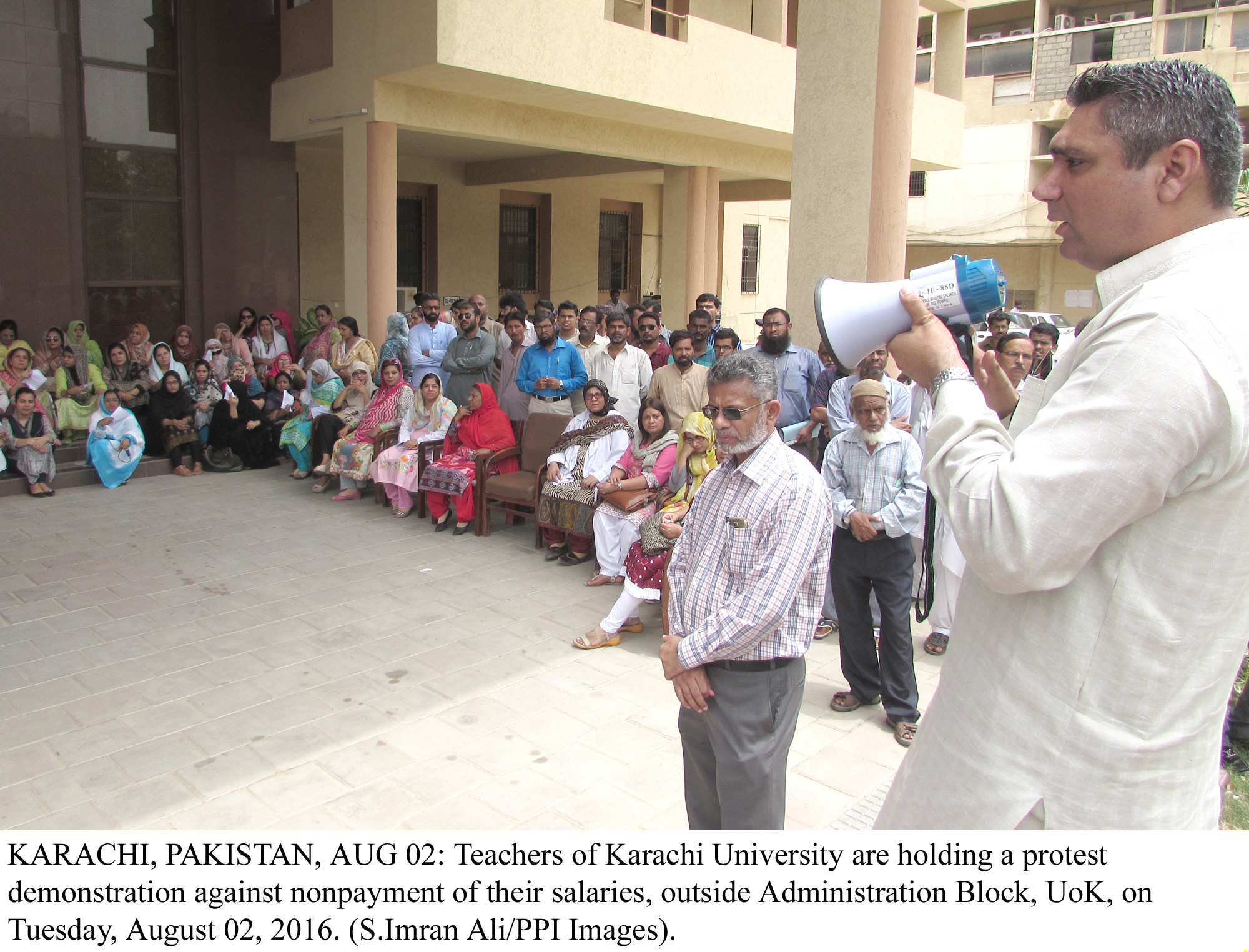 teachers at karachi university hold a protest over non payment of their salaries outside administration block ku on tuesday photo ppi