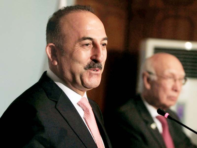 turkish foreign minister mevlut cavusoglu speaks at a news conference with foreign affairs adviser sartaj aziz in islamabad on tuesday photo reuters