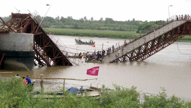 the bridge straddling the river lies along a major highway connecting mumbai to the tourism state of goa photo india live the bridge straddling the river lies along a major highway connecting mumbai to the tourism state of goa photo india live