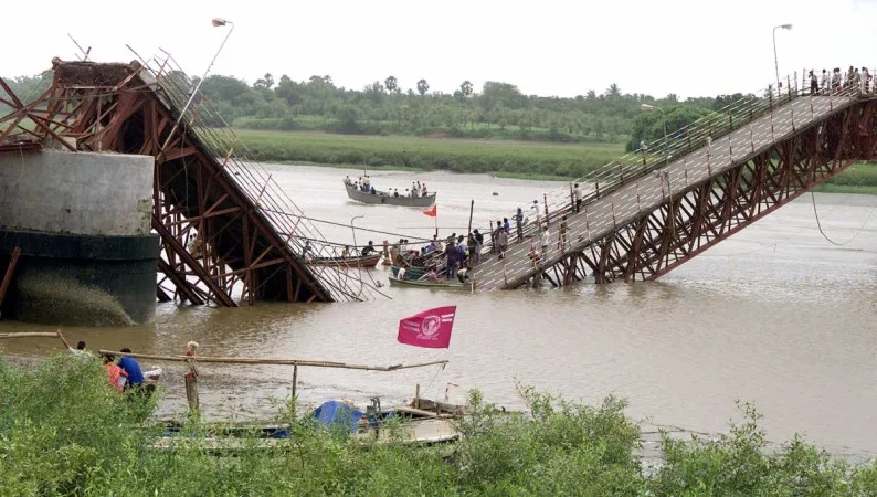 the bridge straddling the river lies along a major highway connecting mumbai to the tourism state of goa photo india live the bridge straddling the river lies along a major highway connecting mumbai to the tourism state of goa photo india live