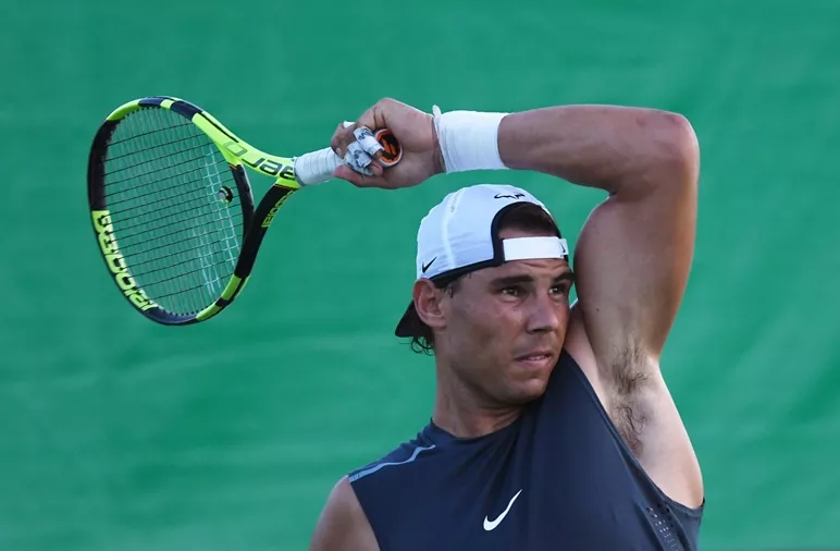 rafael nadal of spain plays a shot during a tennis practice session at the olympic park in rio de janeiro on august 1 2016 ahead of the 2016 rio olympic games photo afp rafael nadal of spain plays a shot during a tennis practice session at the olympic park in rio de janeiro on august 1 2016 ahead of the 2016 rio olympic games photo afp