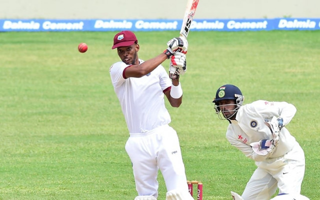 roston chase of west indies connects for a four off a delivery from bowler ravichandra ashwin of india as wicket keeper wriddhiman saha plays close on day five of their second test cricket match on august 3 2016 at sabina park in kingston jamaica photo afp roston chase of west indies connects for a four off a delivery from bowler ravichandra ashwin of india as wicket keeper wriddhiman saha plays close on day five of their second test cricket match on august 3 2016 at sabina park in kingston jamaica photo afp