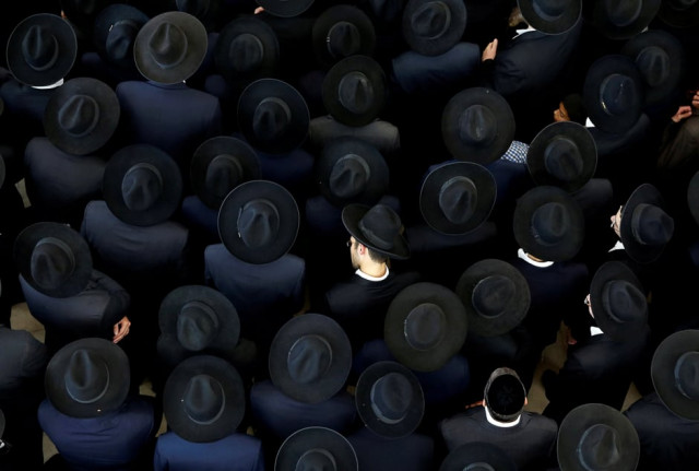 ultra orthodox jewish men take part in the funeral ceremony of rabbi moshe mordechai chadash in jerusalem photo reuters