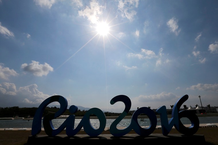 canoe athletes paddle behind olympic sign at deodoro rio de janeiro brazil on august 02 2016 photo reuters