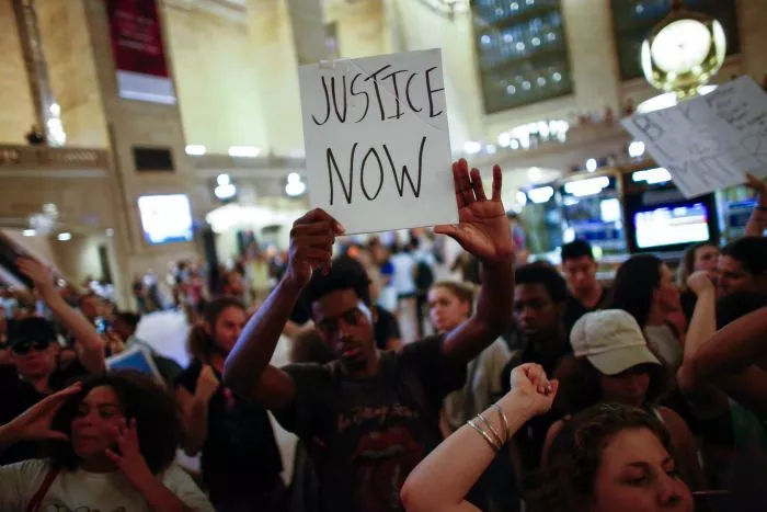 a protest at grand central station in new york on july 8 2016 photo afp a protest at grand central station in new york on july 8 2016 photo afp