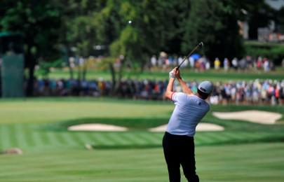 golf championship masih leads day two at seven under par