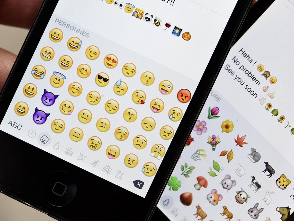 new emojis teased by apple in a blog included women athletes single parents a rainbow flag and a green water pistol photo afp