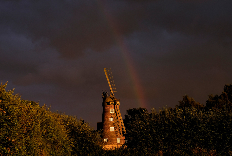 a rainbow forms over a windmill after rainfall in shepshed united kingdom photo reuters