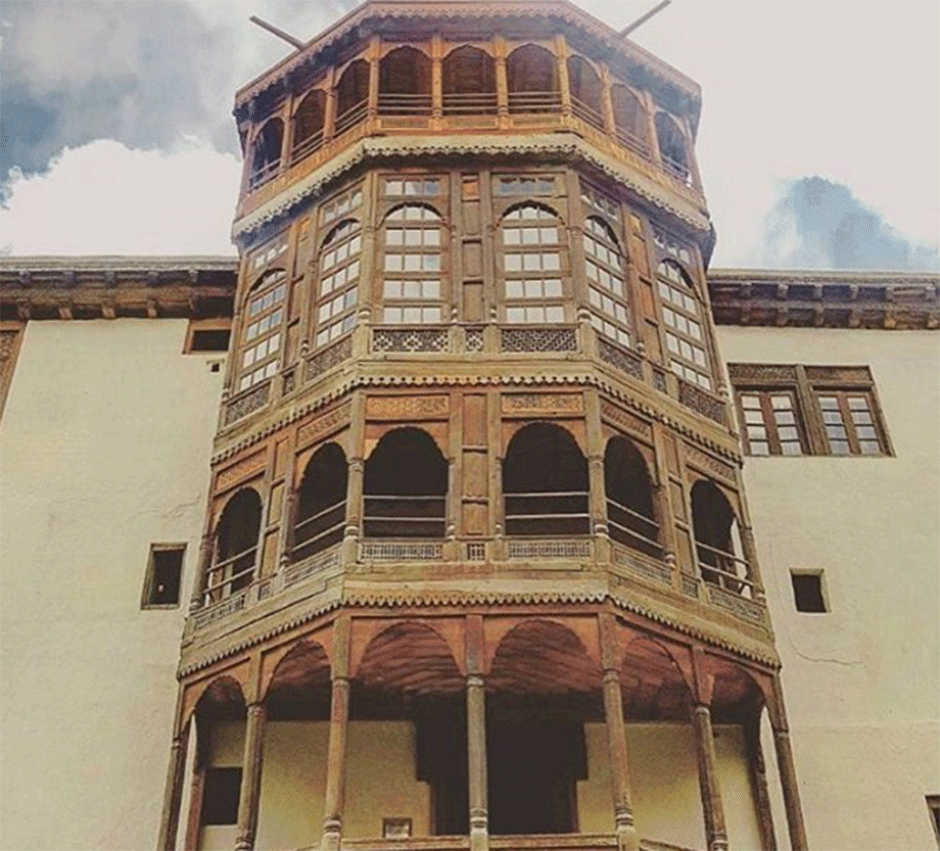 wooden framed windows and the distinct architecture of the khaplu palace in baltistan photo ammar b87