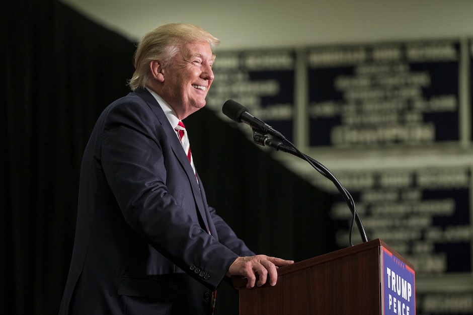 republican presidential candidate donald trump speaks during a rally at windham high school photo afp