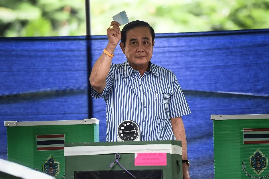 thai prime minister prayuth chan ocha holds up his ballot at his local polling station during the constitutional referendum in bangkok photo afp thai prime minister prayuth chan ocha holds up his ballot at his local polling station during the constitutional referendum in bangkok photo afp