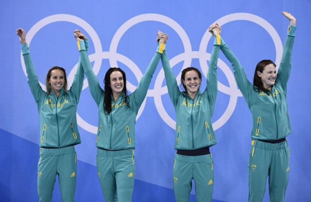 australia 039 s emma mckeon australia 039 s brittany elmslie australia 039 s bronte campbell and australia 039 s cate campbell celebrate on the podium after they broke the world in the women 039 s 4 x 100m freestyle relay final during the swimming event at the rio 2016 olympic games at the olympic aquatics stadium in rio de janeiro on august 6 2016 photo afp australia 039 s emma mckeon australia 039 s brittany elmslie australia 039 s bronte campbell and australia 039 s cate campbell celebrate on the podium after they broke the world in the women 039 s 4 x 100m freestyle relay final during the swimming event at the rio 2016 olympic games at the olympic aquatics stadium in rio de janeiro on august 6 2016 photo afp