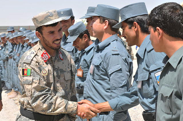 general abdul raziq l kandahar provincial chief of police shakes hands with afghan uniform police instructors at the kandahar regional training center in southern afghanistan jun 7 2012 photo wikimedia commons