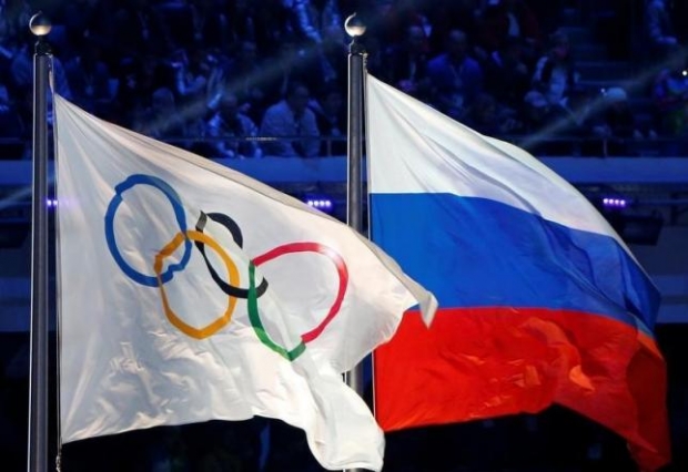 russia s flag right will not get to fly with the olympics flag at the paralympic games photo reuters