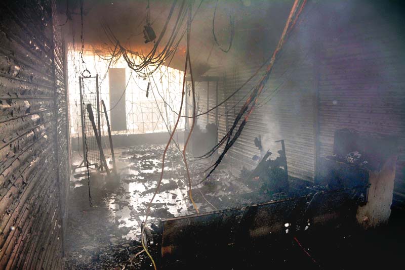 the fire erupted at 10am on the second floor of gul plaza shopping centre which is located on ma jinnah road the fire brigade s spokesperson said that the electricity wiring was completely burnt photo rashid ajmeri express