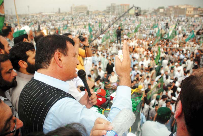 pml n leader ameer muqam addresses a public gathering at ring road peshawar on sunday photo ppi