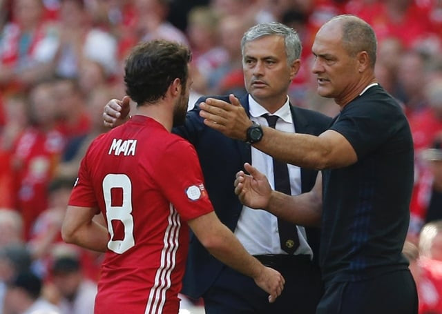 juan mata l is greeted by manager jose mourinho c and first team coach silvino louro r at wembley stadium in london on august 7 2016 photo afp juan mata l is greeted by manager jose mourinho c and first team coach silvino louro r at wembley stadium in london on august 7 2016 photo afp