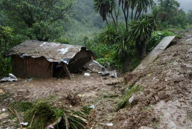 a view of the house where three members of a family died after a mudslide following heavy showers caused by the passing of tropical storm earl in the town of temazolapa in veracruz state mexico august 6 2016 reuters a view of the house where three members of a family died after a mudslide following heavy showers caused by the passing of tropical storm earl in the town of temazolapa in veracruz state mexico august 6 2016 reuters