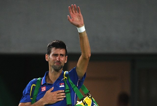 novak djokovic waves to the crowd with tears in his eyes after losing to juan martin del potro at the olympic tennis centre in rio de janeiro on august 7 2016 photo afp