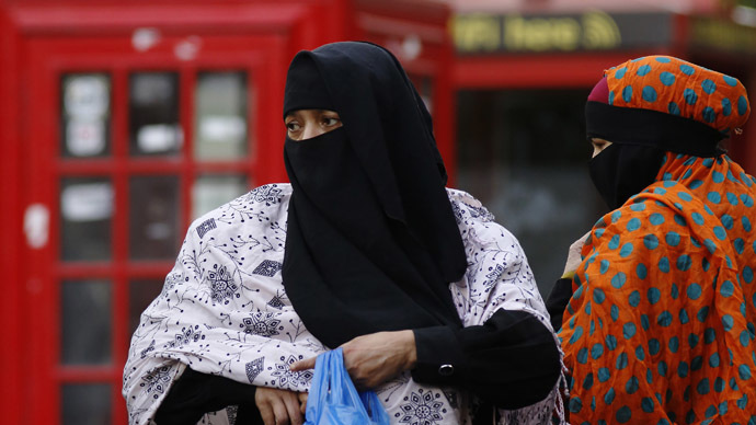 women wears a full face veil as they shop in london september 16 2013 photo reuters