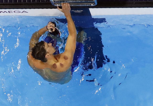 michael phelps reacts after finishing second photo reuters