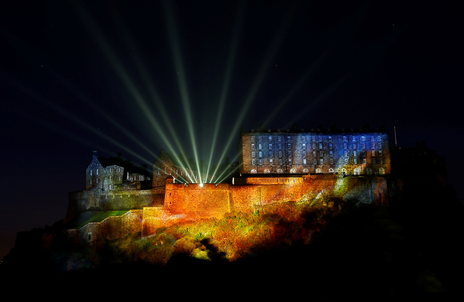 a digital light show called quot deep time quot is beamed onto edinburgh castle to mark the start of the edinburgh fringe festival in edinburgh scotland photo reuters