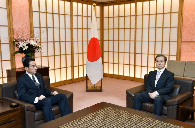 japanese foreign minister fumio kishida l meets chinese ambassador to japan cheng yonghua in tokyo japan photo reuters