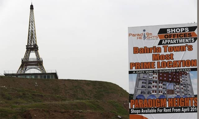 a replica of the eiffel tower is seen on a hill in an area being developed in bahria town on the outskirts of islamabad photo reuters a replica of the eiffel tower is seen on a hill in an area being developed in bahria town on the outskirts of islamabad photo reuters