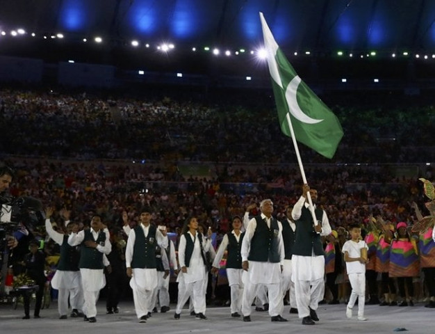 flagbearer ghulam mustafa bashir pak of pakistan leads his contingent during the opening ceremony photo reuters flagbearer ghulam mustafa bashir pak of pakistan leads his contingent during the opening ceremony photo reuters