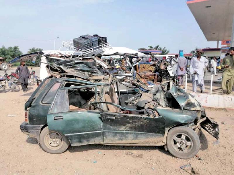 a view of the wreckage of the car and the van that collided head on in muzaffargarh photo express