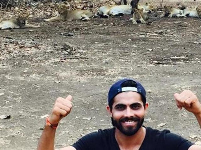indian cricketer fined 300 for lion selfies indian cricketer fined 300 for lion selfies
