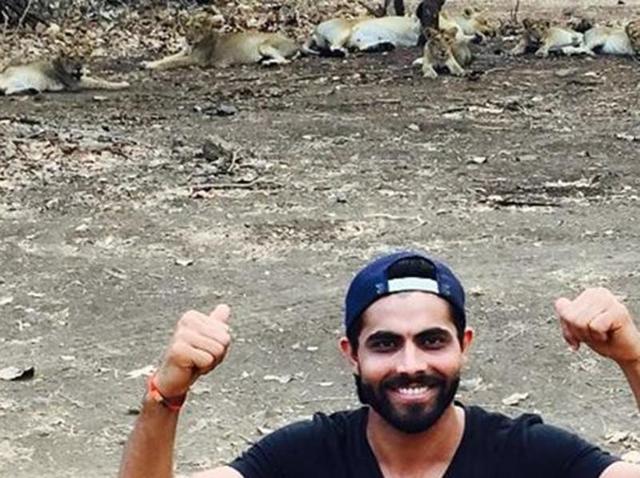 photos of jadeja posing in front of a pride of lions during a safari in gir forest went viral on social media photo twitter