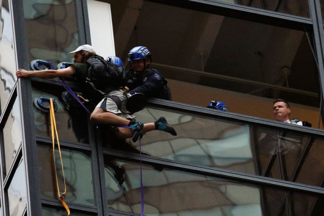 officers from the nypd embrace a man to stop him from climbing the outside of trump tower in new york u s august 10 2016 photo reuters officers from the nypd embrace a man to stop him from climbing the outside of trump tower in new york u s august 10 2016 photo reuters