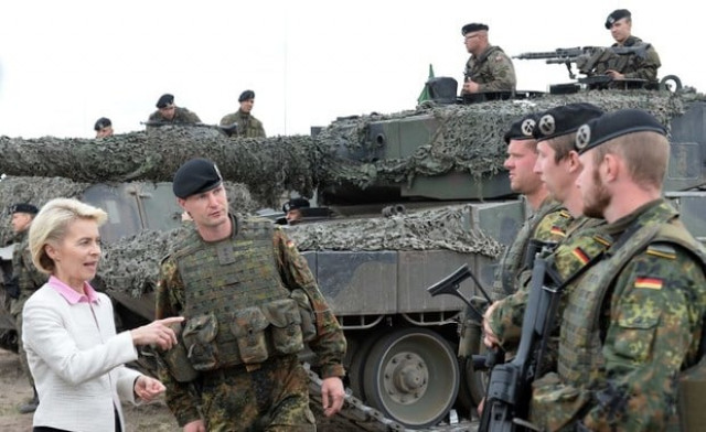 german defence minister ursula von der leyen l speaks with german soldiers after a nato response force nrf exercise in zagan southwest poland on june 18 2015 photo afp german defence minister ursula von der leyen l speaks with german soldiers after a nato response force nrf exercise in zagan southwest poland on june 18 2015 photo afp