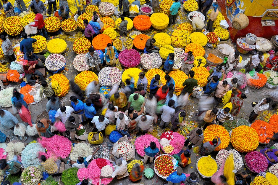 people gather at a flower market on the day of the south indian hindu festival of quot varalakshmi vratham quot in bengaluru india photo reuters